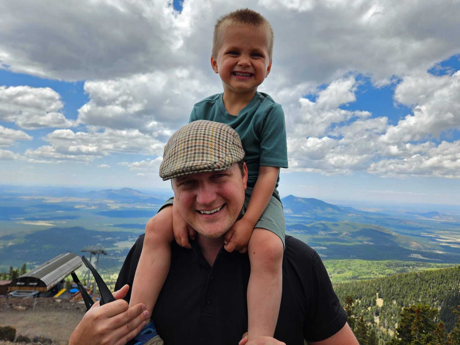 Business owner with young son